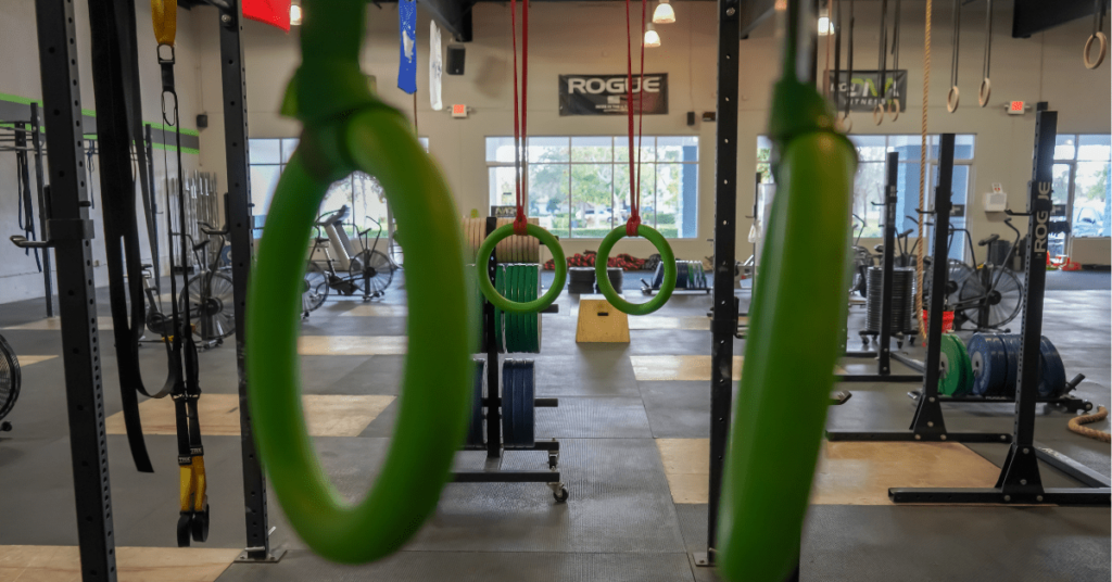 green hanging rings in a gym
