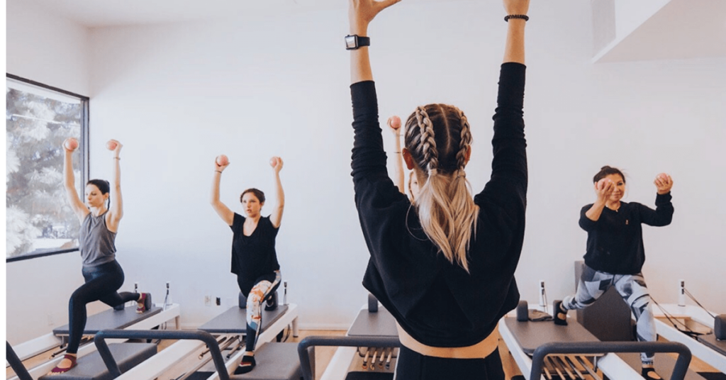 pilates class of four people