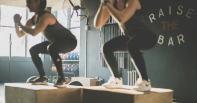 two women box jumping