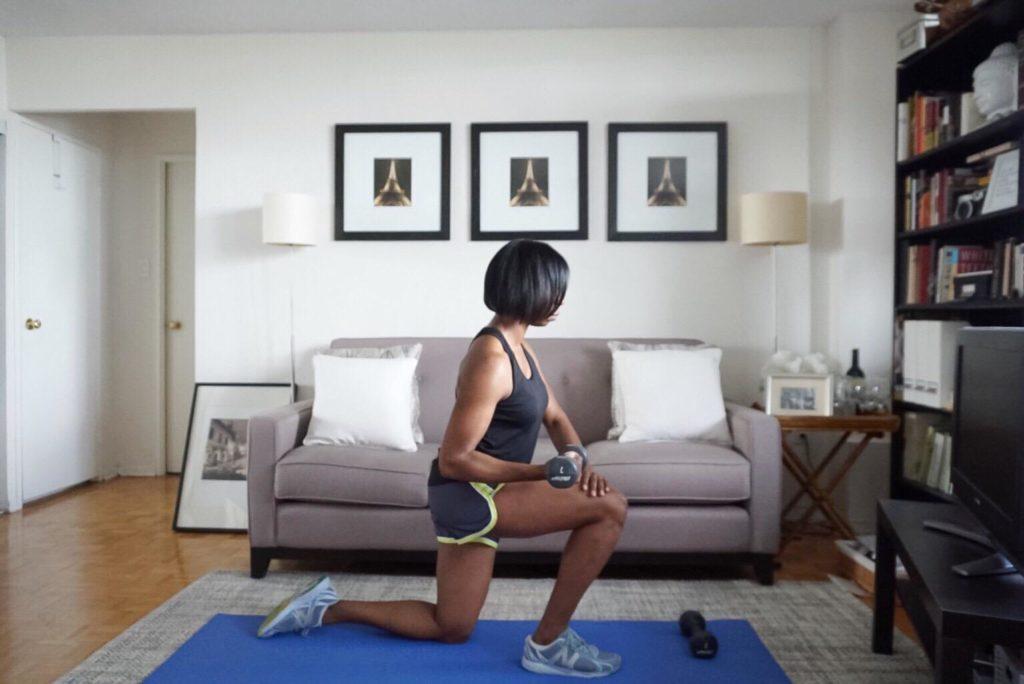 woman working out on living room