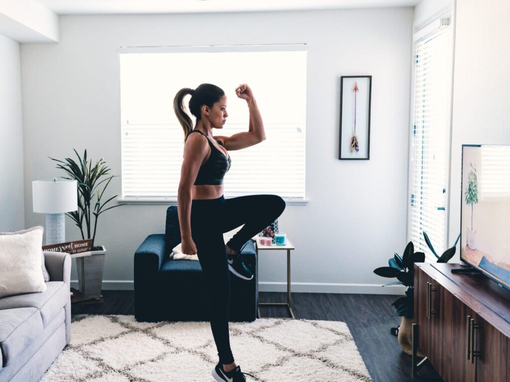 woman working out at tv