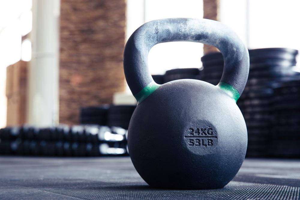 Closeup image of a kettle ball in fitness gym