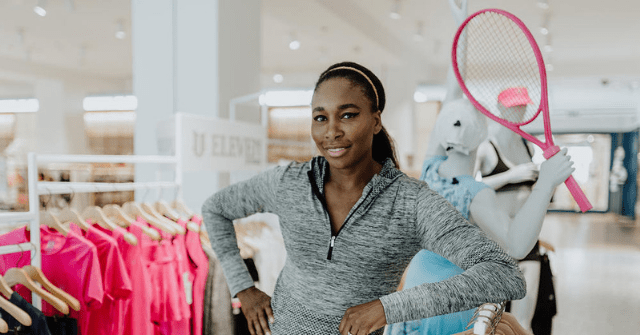 Venus Williams in a clothing store surrounded by clothes