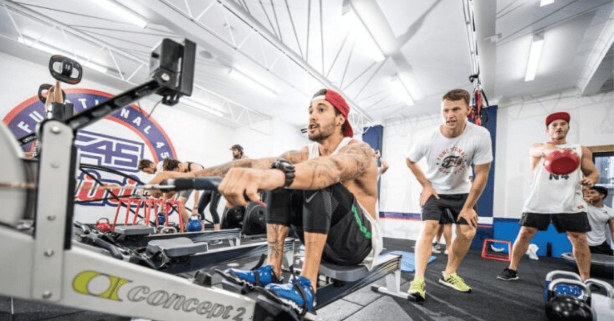 a person on a rowing machine in and f45 studio 