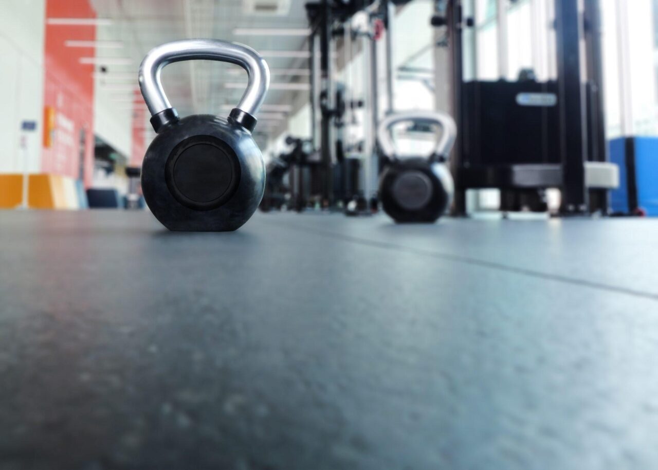 Focus on black kettlebell at the gym