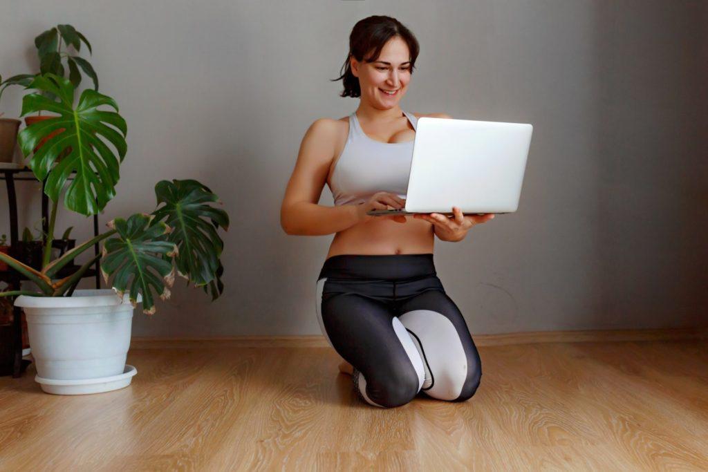 exercise-woman-girl-lifestyle-home-sport-people-person-healthy-body-female-fitness-floor-laptop_t20_drJX8j